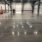 Concrete floor treated with RetroPel oil and water repellent