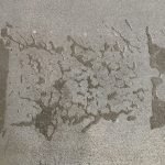 Concrete floor treated with RetroPel oil and water repellent