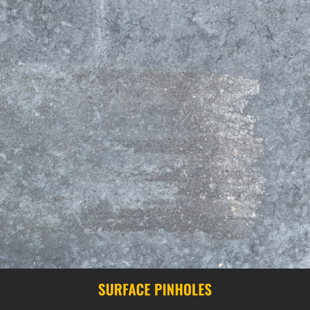 Concrete floor close-up of surface pinholes on the sop surface.